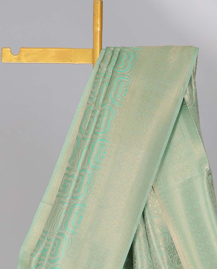 Green geometric softy saree, geometric design border & pallu of intricate designs