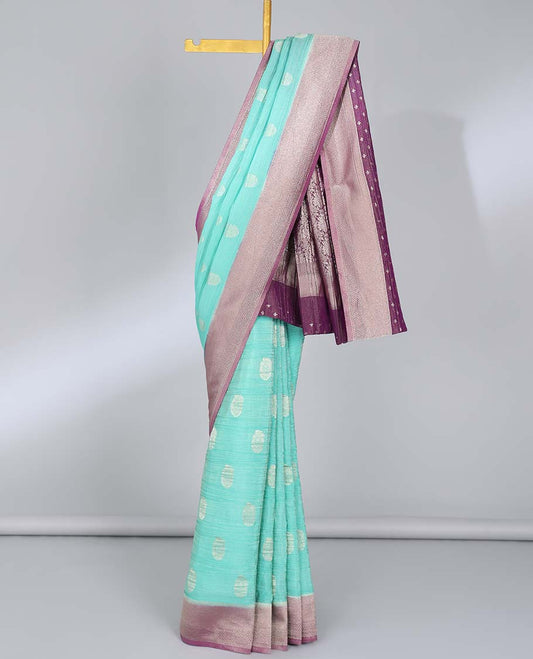 Turquoise crushed tissue saree with buttas, contrast traditional design border & intricate pallu