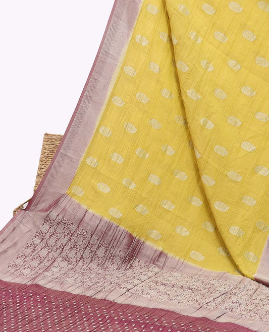 Yellow crushed tissue saree with buttas, contrast traditional design border & intricate pallu