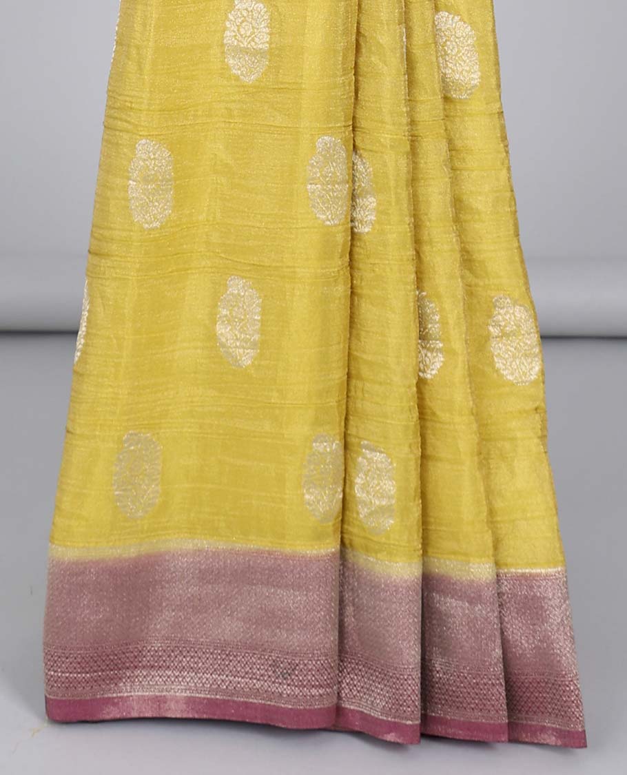 Yellow crushed tissue saree with buttas, contrast traditional design border & intricate pallu