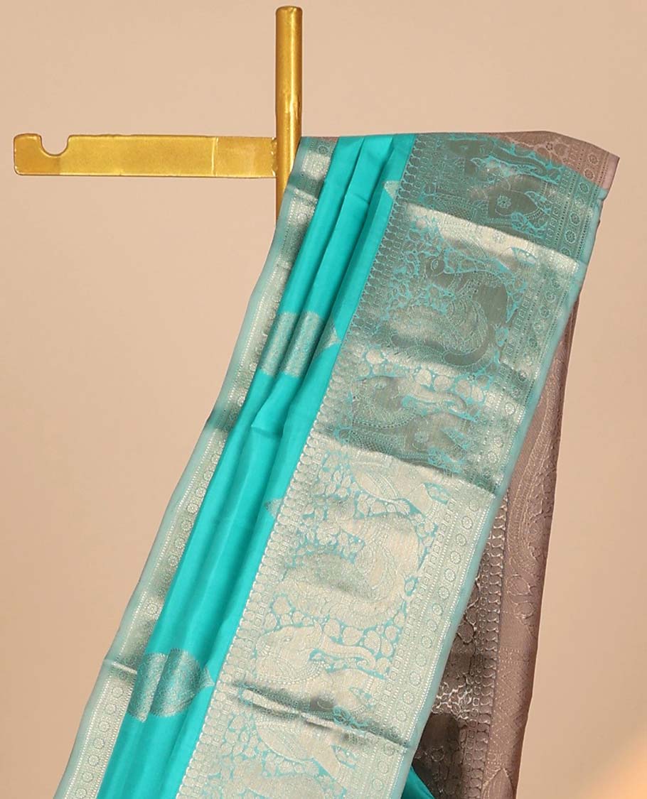 Blue zari buttas silk saree, zari border of manga,kamalam,muthu,mayil & yaanai & contrast intricate pallu