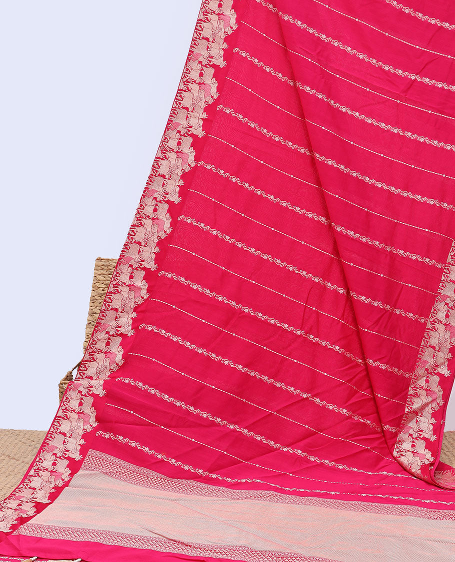Pink mushru silk saree with floral stripes, pichwai cow steeped border & intricate pallu