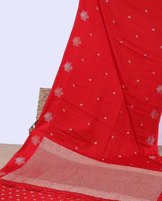 Red mushru silk saree with leaf buttas, flower design border & jaal pallu