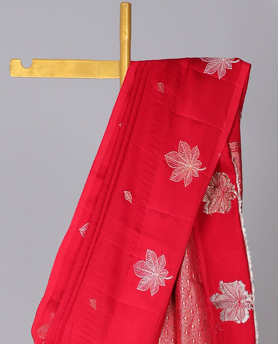 Red mushru silk saree with leaf buttas, flower design border & jaal pallu