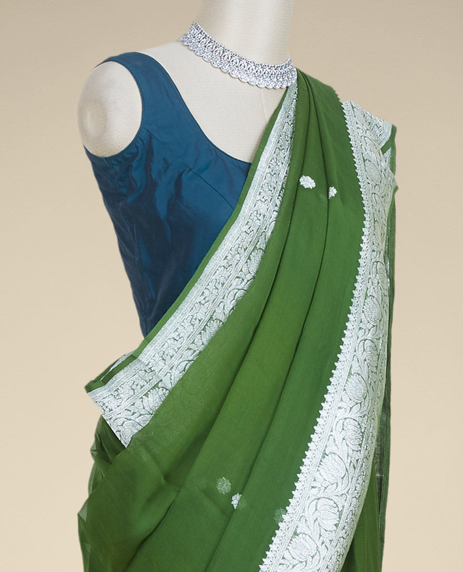 Green banaras georgette saree with buttas, traditional border of floral creeper designs