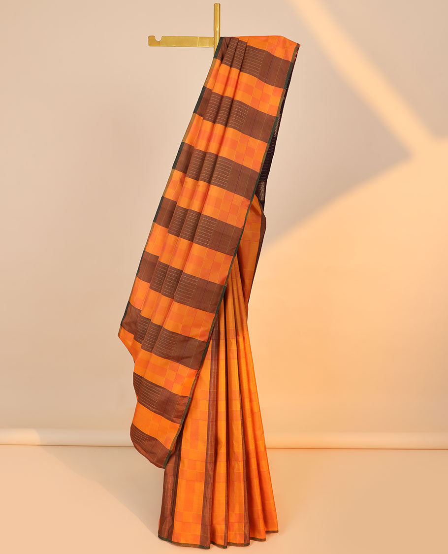 Borderless orange checked Kanchipuram silk saree, contrast pallu of seppu rekku designs