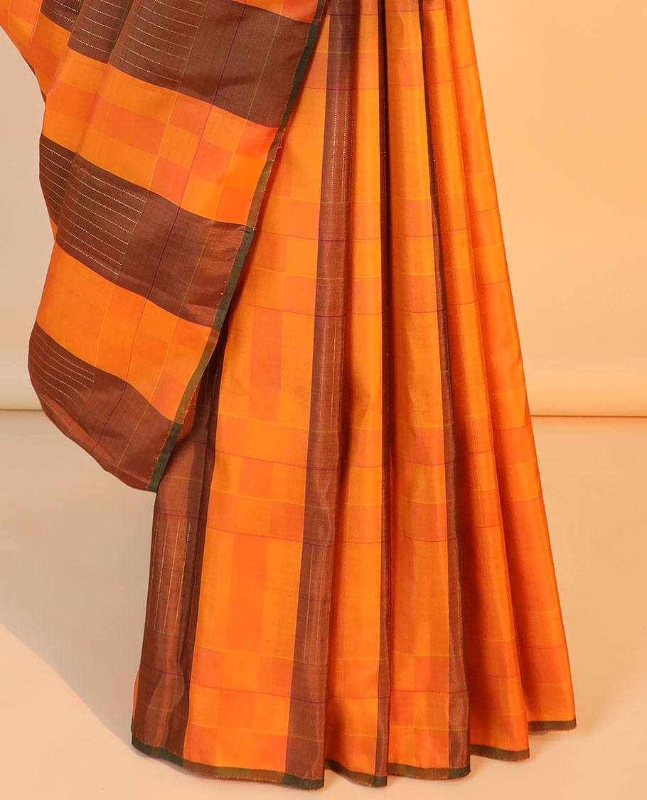 Borderless orange checked Kanchipuram silk saree, contrast pallu of seppu rekku designs