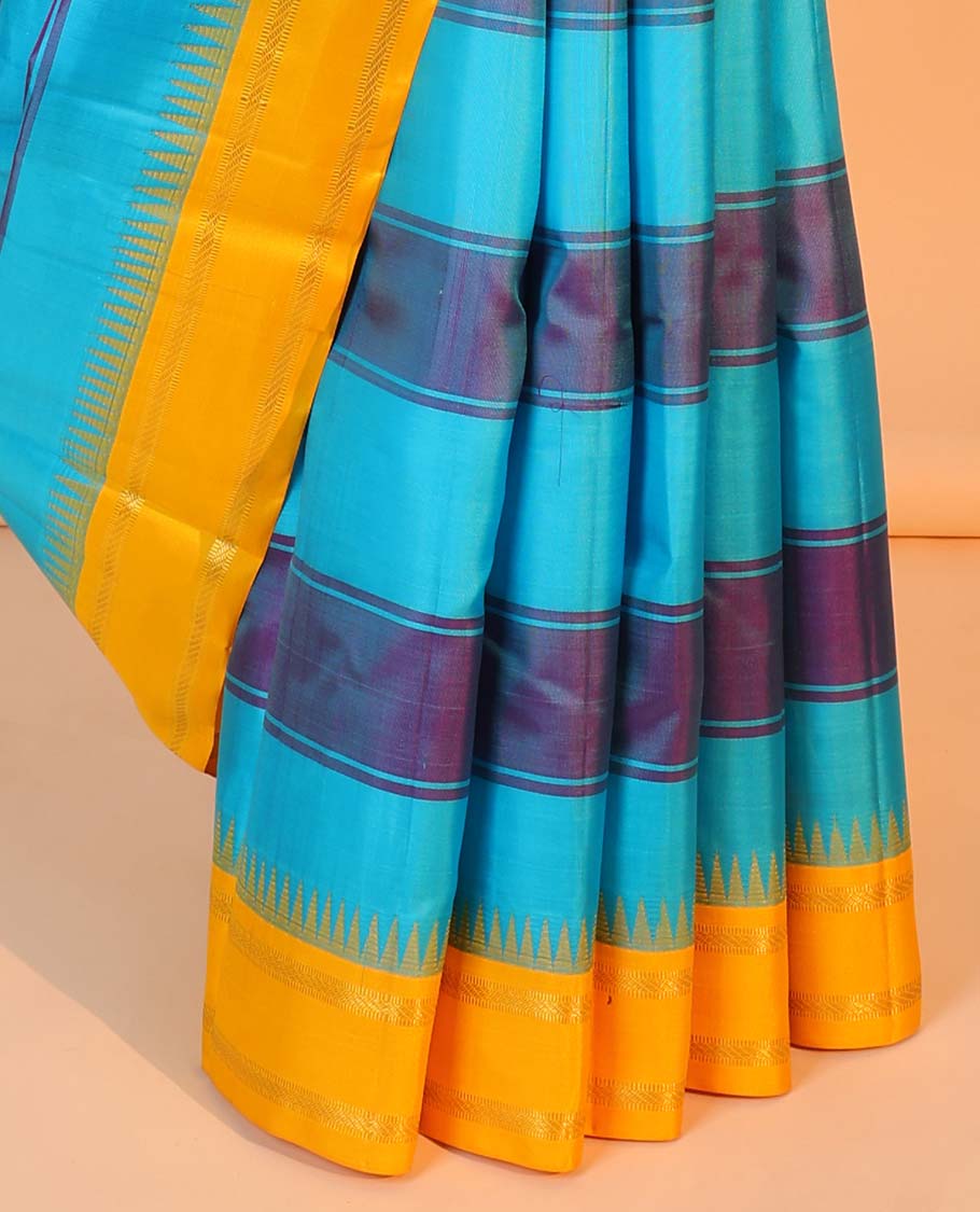 Blue striped kancheepuram silksaree, contrast zari striped pallu & border of temple rettai pettu border of muthu design