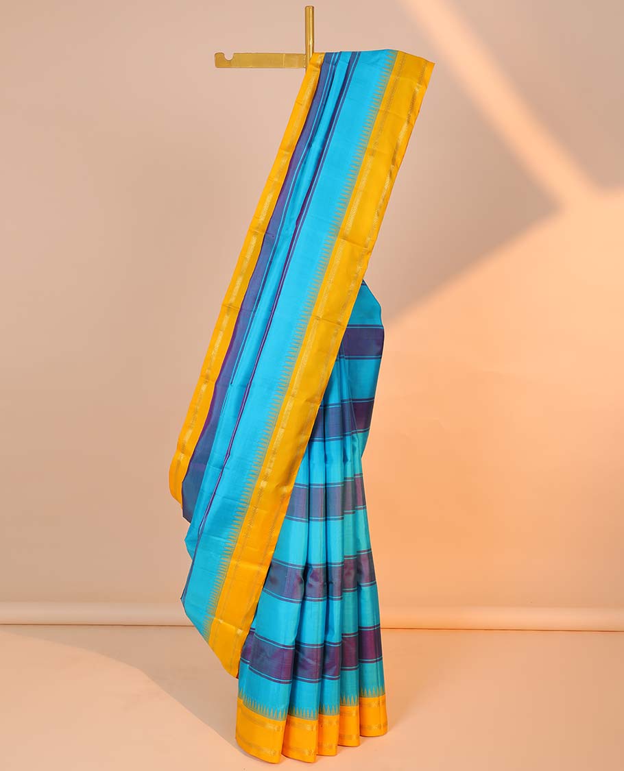 Blue striped kancheepuram silksaree, contrast zari striped pallu & border of temple rettai pettu border of muthu design