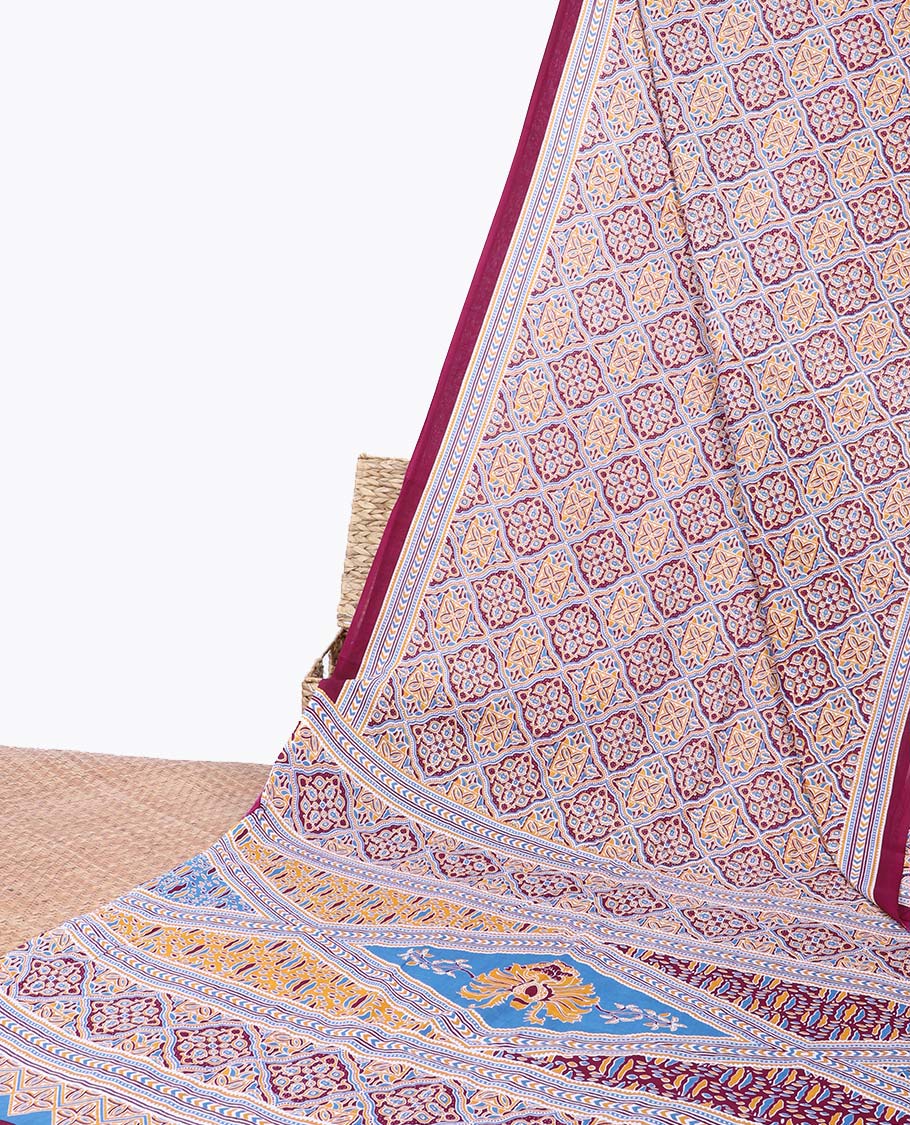 Maroon ajrakh printed mul-mul cotton saree, geometric printed border & intricately printed pallu