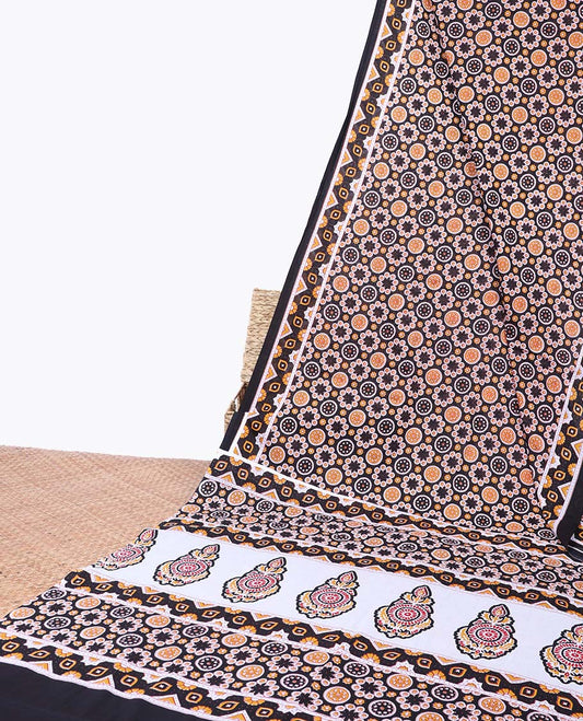 Black flower motifs printed mul-mul cotton saree, printed border & intricate pallu