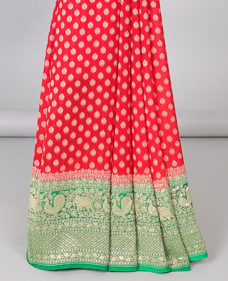 Red khaddi georgette saree with buttas, contrast intricate pallu & border steeped with traditional designs