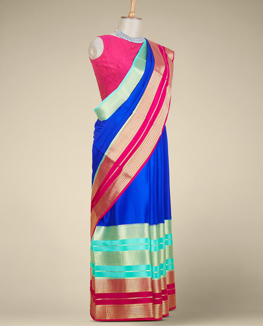 Blue plain mysore silk saree, contrast dual-colored big border steeped with traditional zari designs