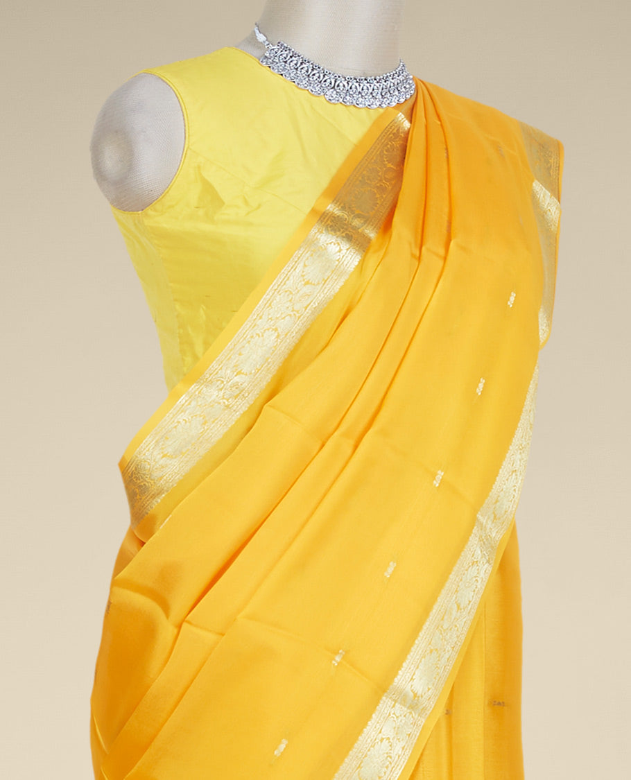 Yellow mysore silk saree with zari buttas, traditional zari design border