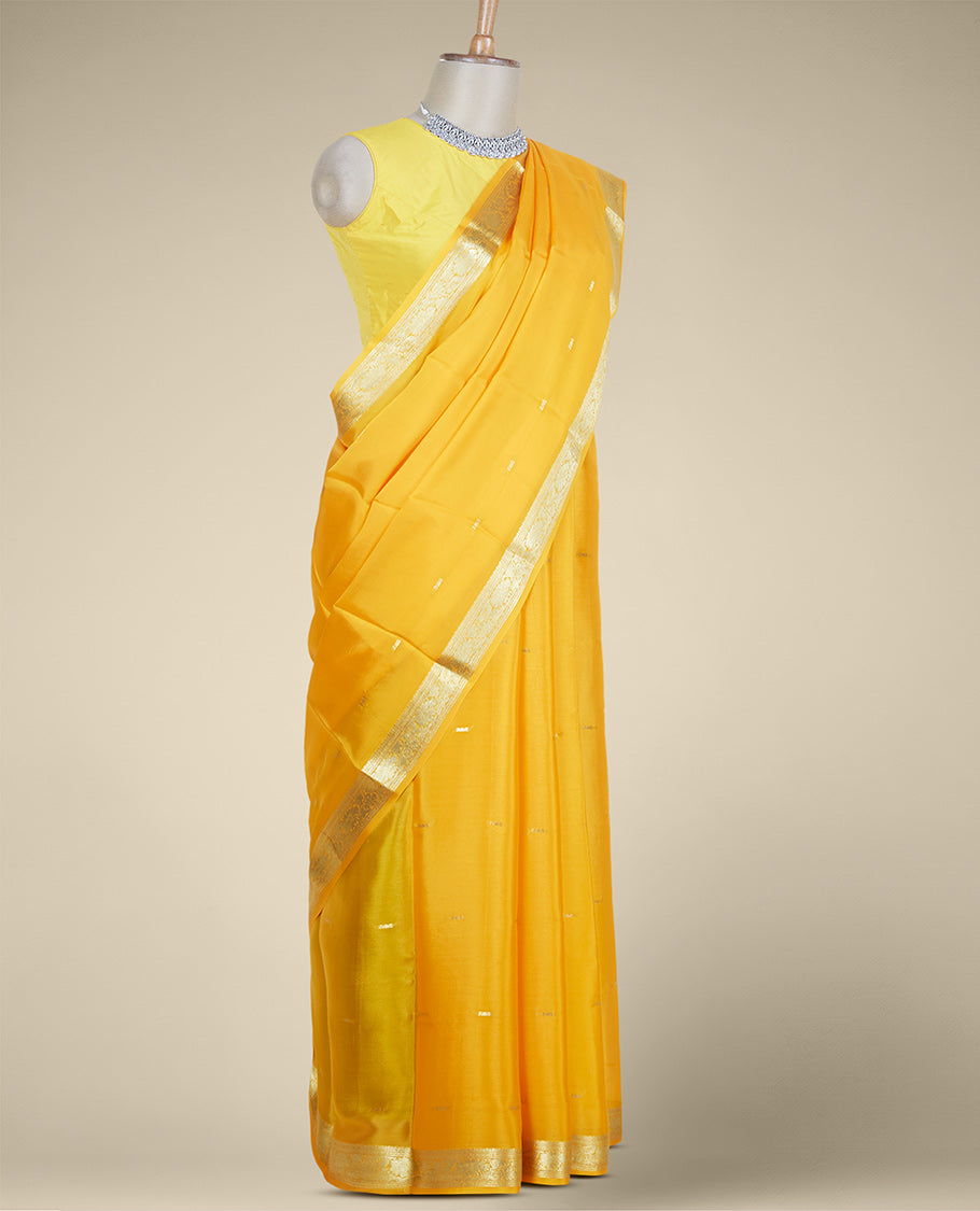 Yellow mysore silk saree with zari buttas, traditional zari design border