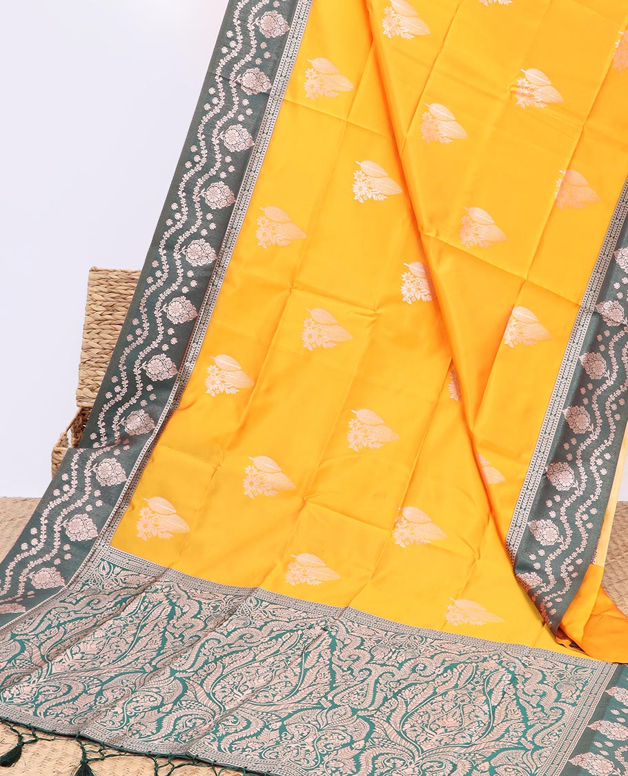 Yellow butter silk saree with zari buttas, contrast floral design border & pallu of zari intricate designs