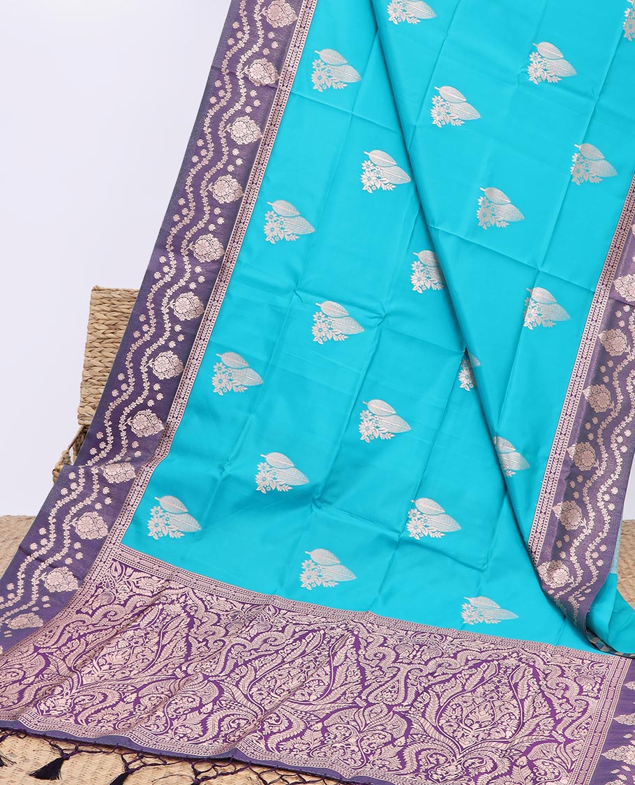 Blue butter silk saree with zari buttas, contrast floral design border & pallu of zari intricate designs