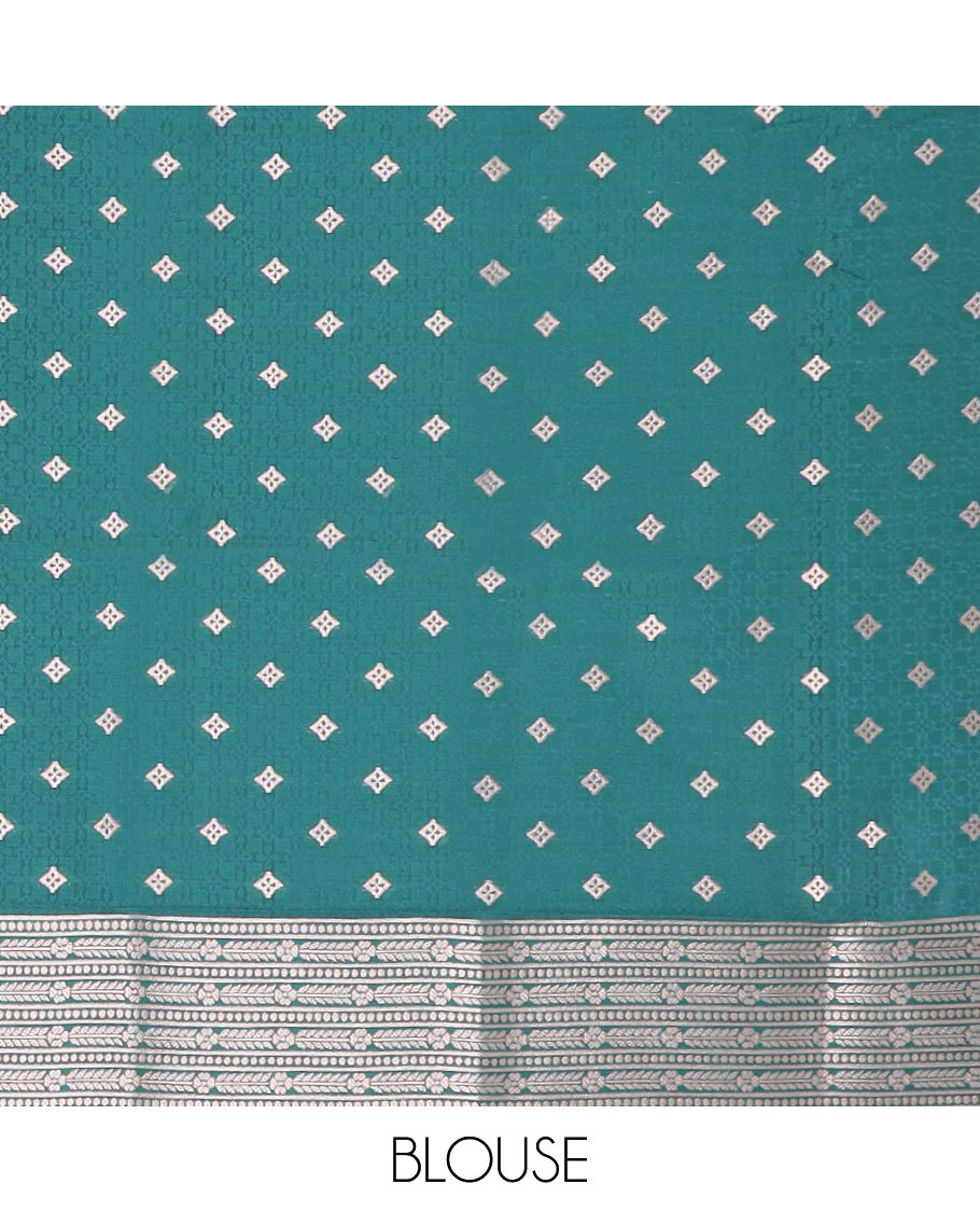 Peach butter silk saree with zari buttas, contrast floral design border & pallu of zari intricate designs