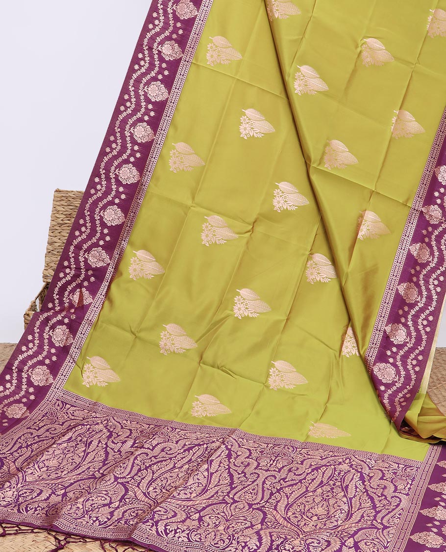 Green butter silk saree with zari buttas, contrast floral design border & pallu of zari intricate designs