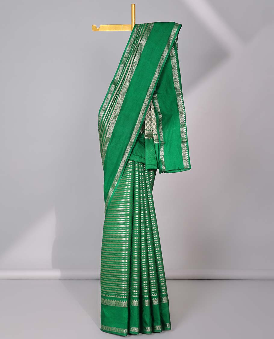 Grey semi-banaras tussar saree with zari designs, traditional zari border & jaal pallu