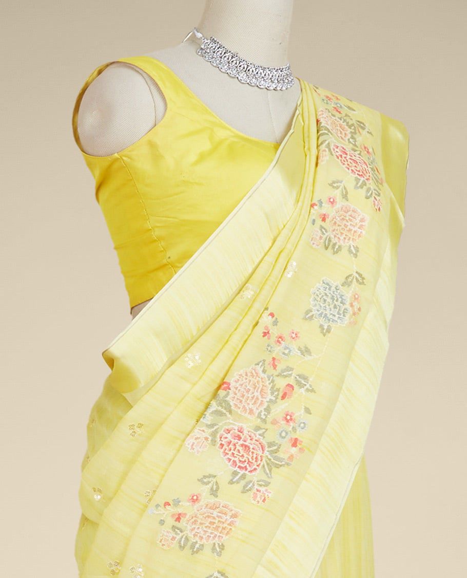 Yellow colorful floral vine embroidered pure chiffon saree, plain border