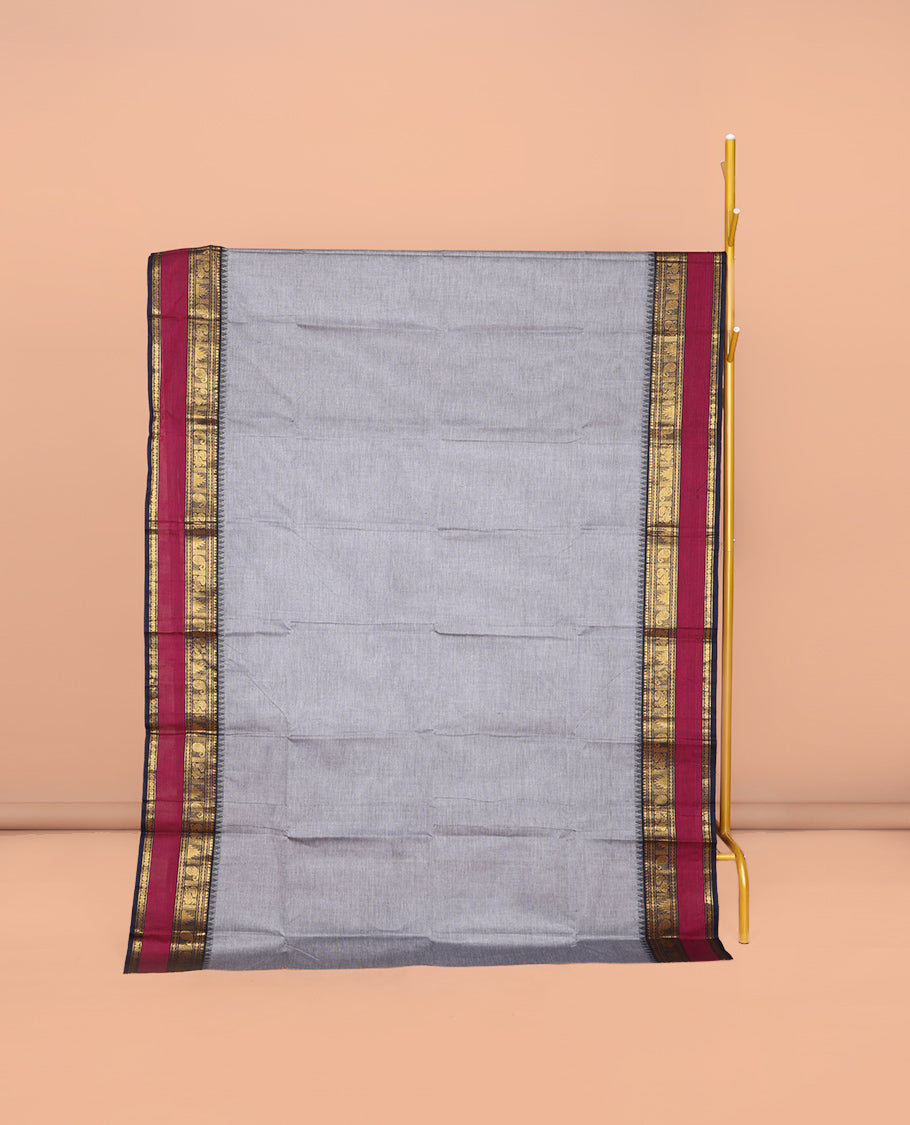 Grey Plain Chettinad Cotton Saree, Complemented by Contrast Rettai Pettu Traditional Design Temple Border, Striped Pallu, and Paired with a Matching Blouse