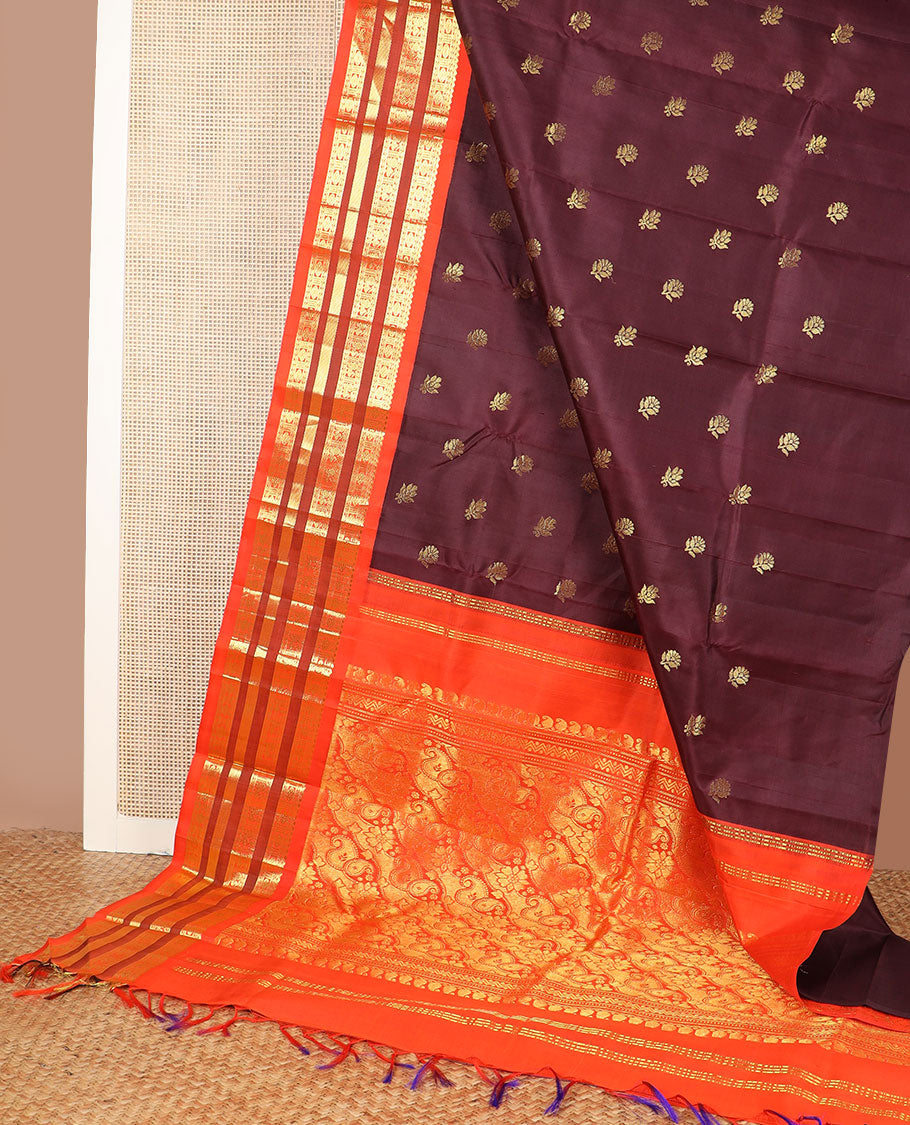 Maroon zari buttas kanchipuram silk saree, contrast one-sided korvai border of salngai,neli,rudraksham, & mayil & paisley design pallu