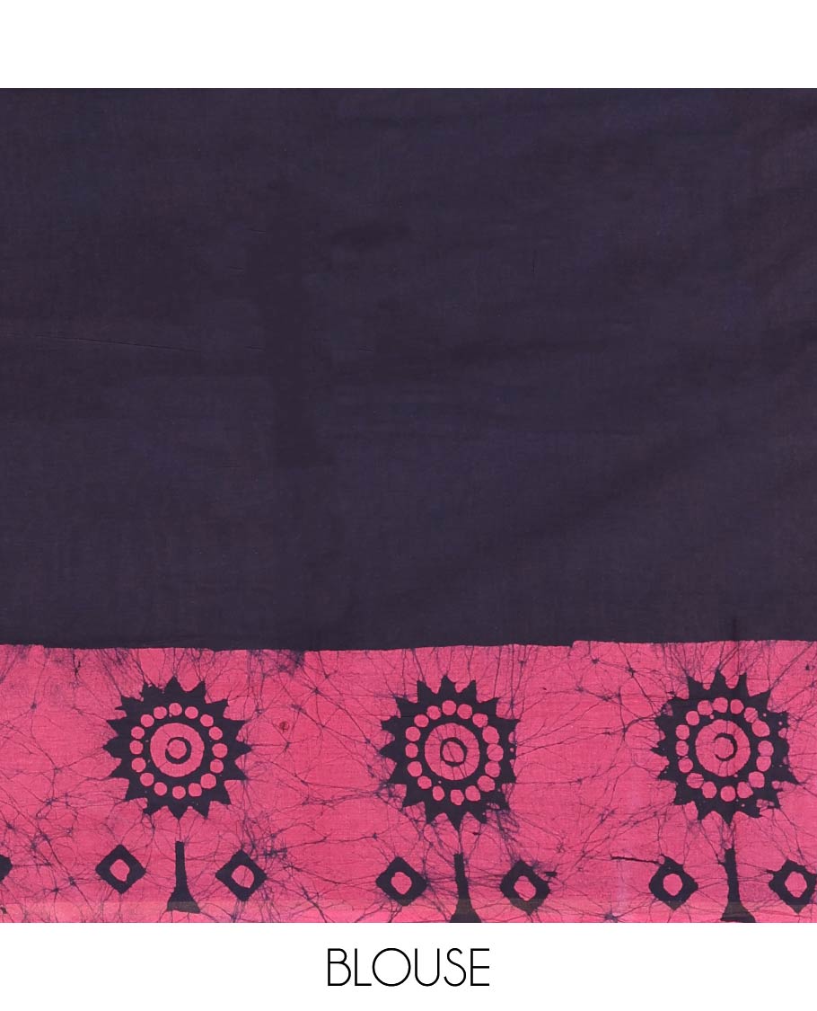 Navy Blue Mul Cotton Saree Accentuated with Batik-Style Floral Motifs Print, Featuring a Batik-Style Geometric Printed Border, Pallu Mirrors the Same Print, and Paired with a Matching Blouse