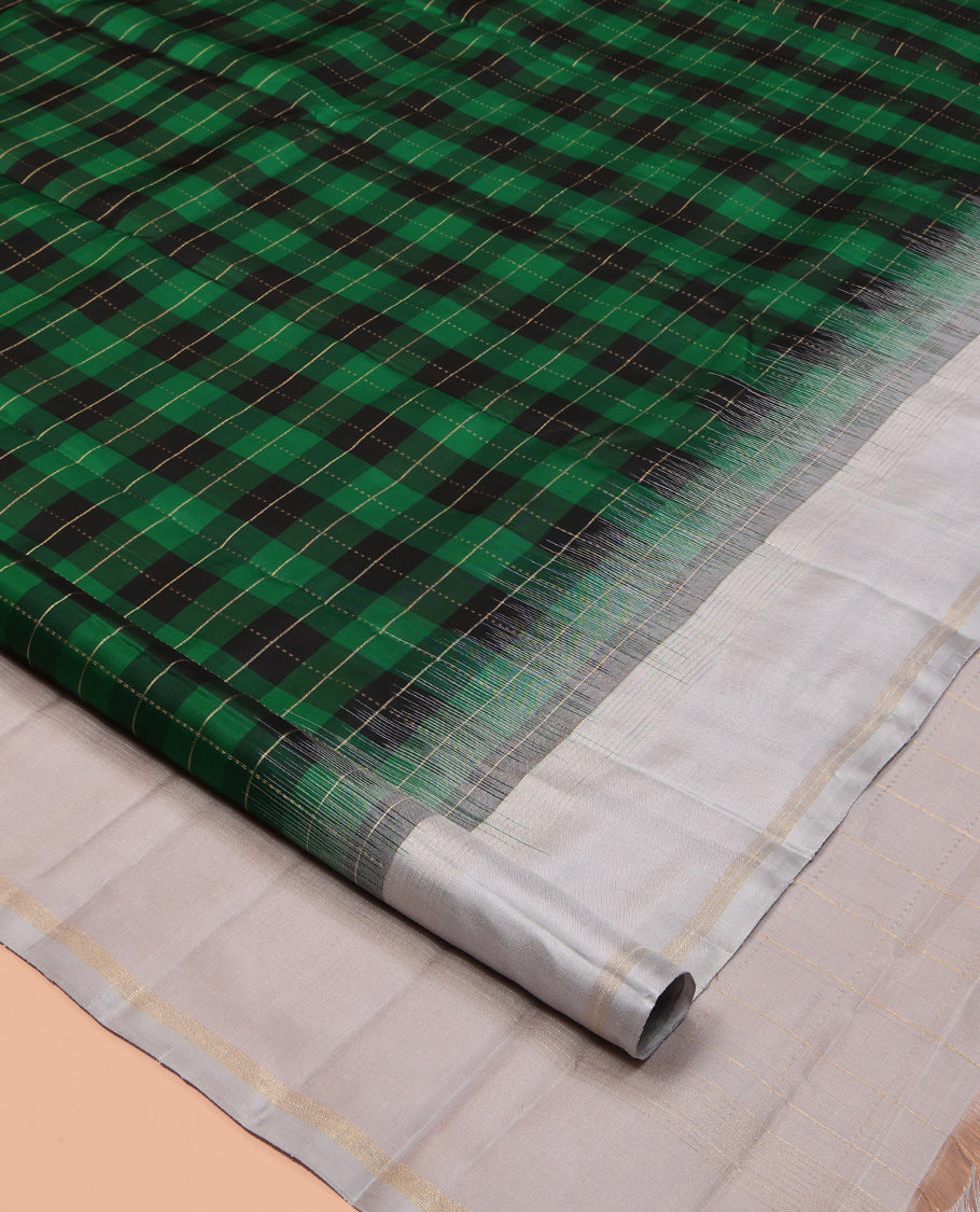 Green Checked Kanchipuram Silk Saree, Complemented by a Contrast Border of Zari Stripes, Zari Checked Pallu, and a Contrast Blouse