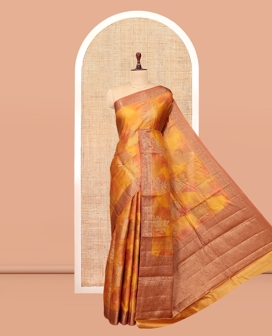 Yellow-Orange Tussar Silk Saree, Subtly Sparkled with Zari Buttas, Highlighted by a Zari Border, Floral Design Pallu, and a Matching Blouse