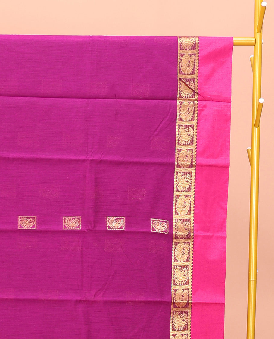 Rani Pink Semi-Silk Cotton Saree, Woven with Zari Buttas All Over Its Body, Complemented by a Contrast Kal Eragina Border of Peacock Designs, Pallu Steeped with Elephant Zari Motifs, and Paired with a Matching Blouse