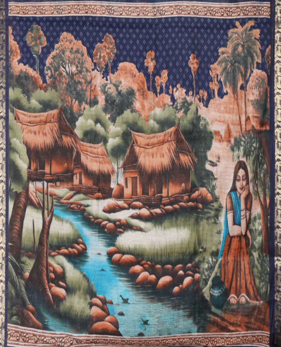 Blue Muslin Cotton Saree Adorned with Zig-Zag Shibori Patterns Prints, Complemented by a Contrast Border of Deer Motifs in Zari, Pallu Decked Up with Scenery Print, and Paired with a Contrast Polka Dots Printed Blouse