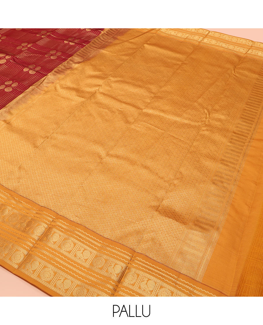 Orange Vasundhara Lite Silk Mix Saree, Majestically Detailed with Zari Butta Enclosed Checked Design on Its Body, Complemented by a Contrast Border of Neli, Kathir, Mayil, and Chakram Designs, Intricately Designed Pallu, and Paired with a Contrast Blouse