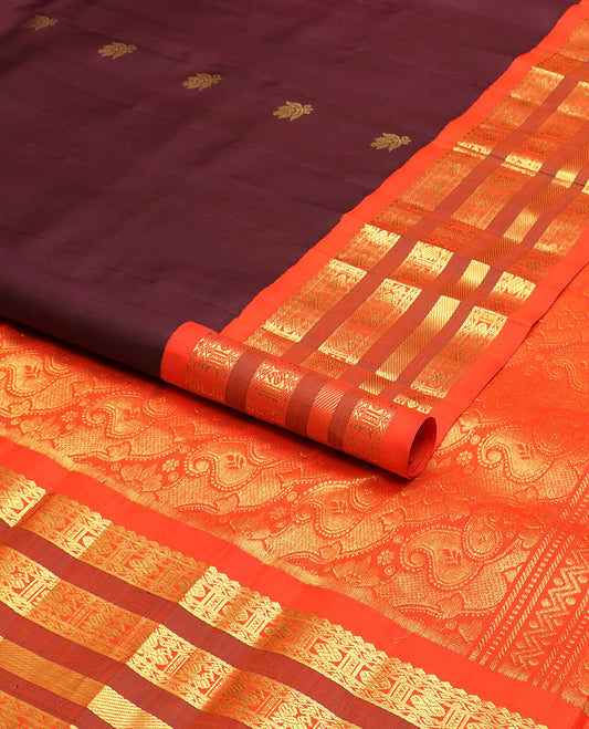 Maroon zari buttas kanchipuram silk saree, contrast one-sided korvai border of salngai,neli,rudraksham, & mayil & paisley design pallu