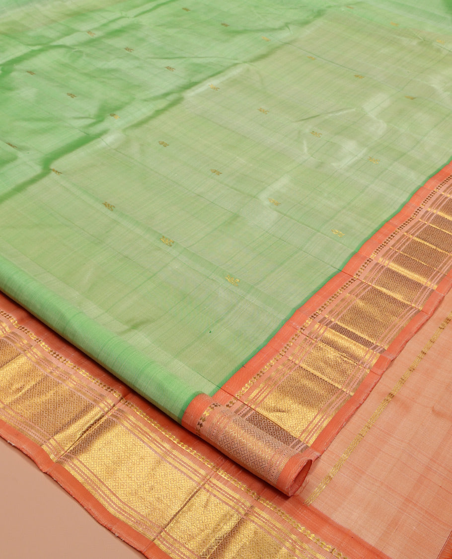 Pista Green Kanchipuram Silk Saree, Woven with Zari Buttas, Contrast One-Sided Border of Panner Sombu, Banaras, Muthu, and Jaal Designs, Zari Design Pallu, and No Blouse