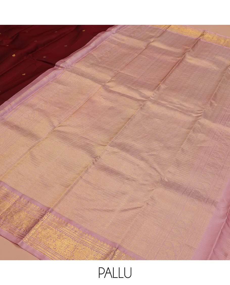 Maroon Vasundhara Silk Saree, Embellished with Zari Buttas All Over Its Body, Complemented by a Contrast Border of Manga, Banaras, Muthu, Neli, and Mayil Designs, Grand Pallu, and Paired with a Contrast Blouse
