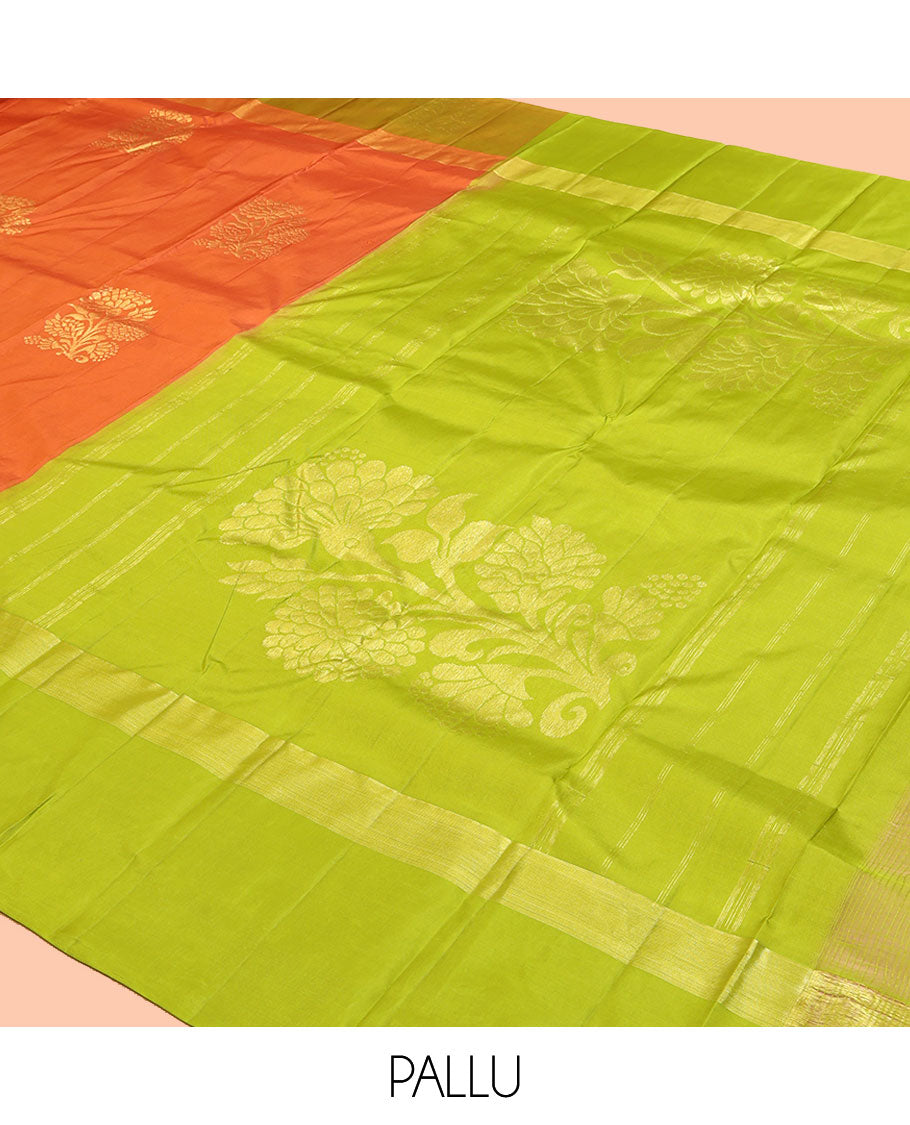Orange Kanchipuram Silk Saree, Elevated with Floral Zari Buttas, a Contrast Floral Zari Buttas, Grand Floral Pattu, and a Contrast Blouse