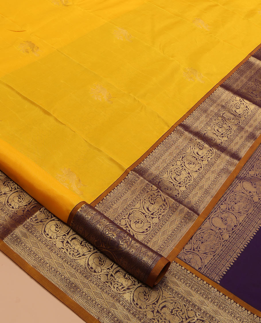 Yellow Vasundhara Lite Silk Mix Saree, Sparsely Woven with Zari Buttas, a Contrast Border of Mayil and Yaali Designs, Grand Pallu, and a Contrast Blouse