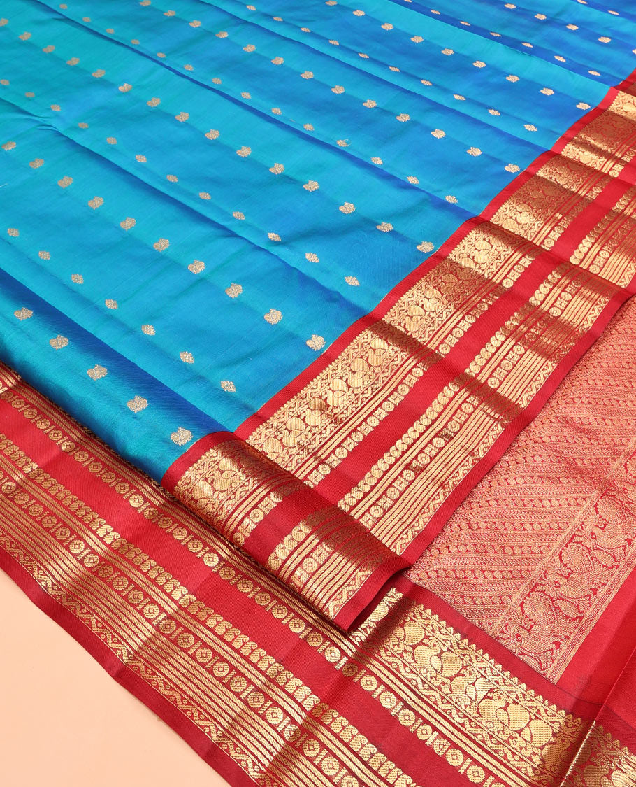 Blue Vasundhara Silk Saree, Crafted with Zari Buttas, Complemented by a Contrast Border of Rekku, Neli, Manga, and Mayil Designs, Intricate Pallu, and a Contrast Blouse