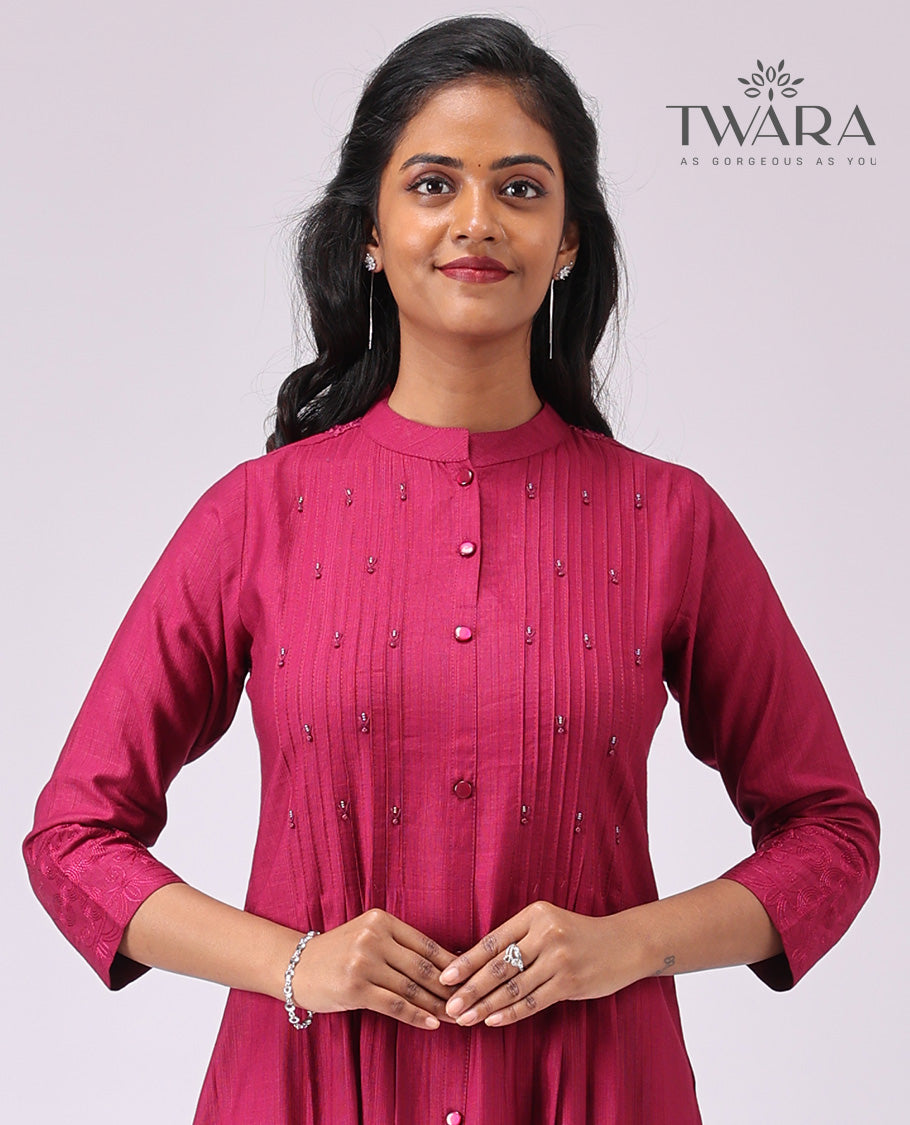 Twara Maroon embroidered motifs chinese neck, 3/4 th sleeve , bleow knee lenght kurti