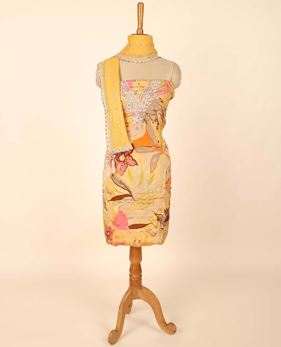 Yellow material chudidhar set, floral print & embroidered top, plain bottom & sequins embroidered dupatta