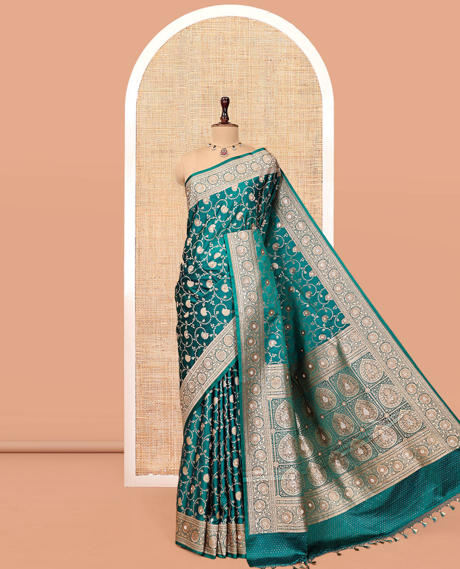 Green Banarasi Satin Saree, Bedecked with Floral Jaal Jacquard, a Floral Creeper Border, Intricate Stonework Pallu, and a Matching Blouse