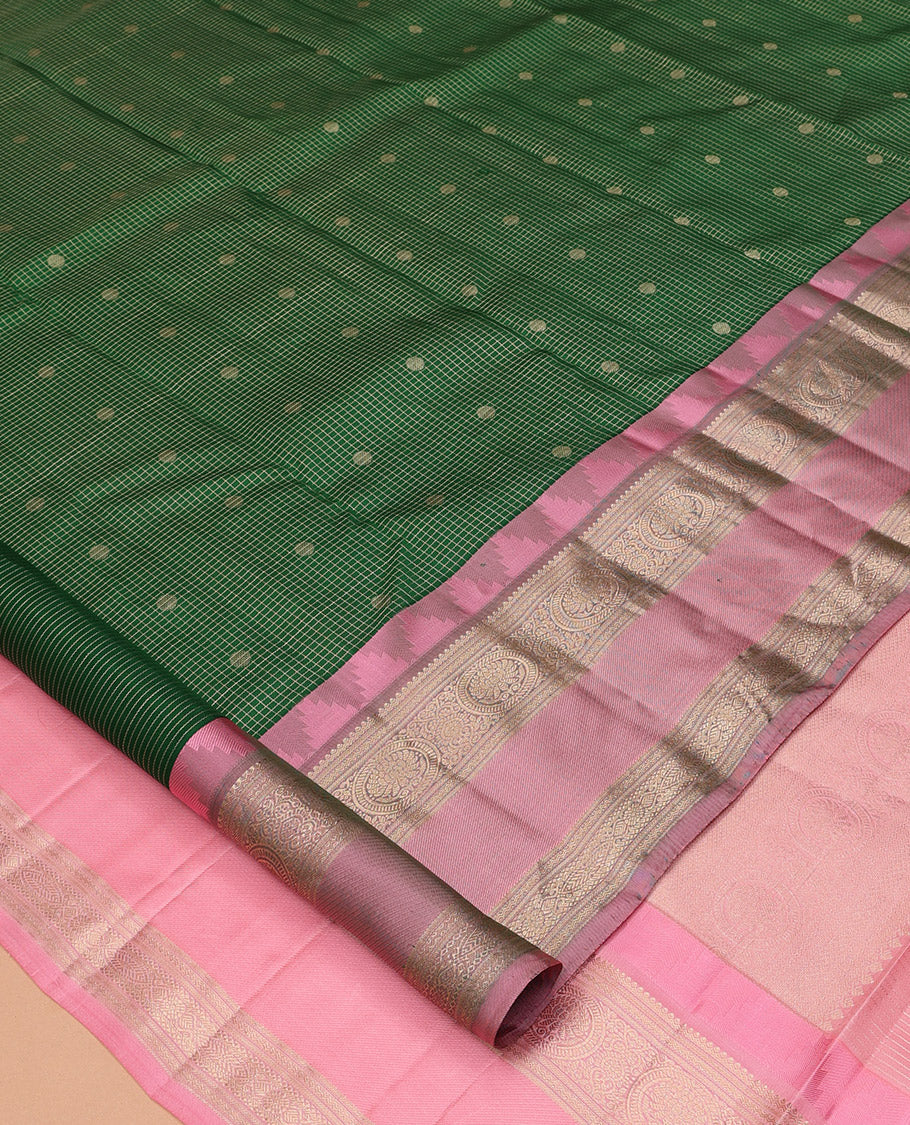 Green Vasundhara Silk Saree, Woven with Zari Buttas and Checks, a Contrast Thazampoo Rekku Border of Chakram Designs, Grand Pallu, and a Contrast Blouse