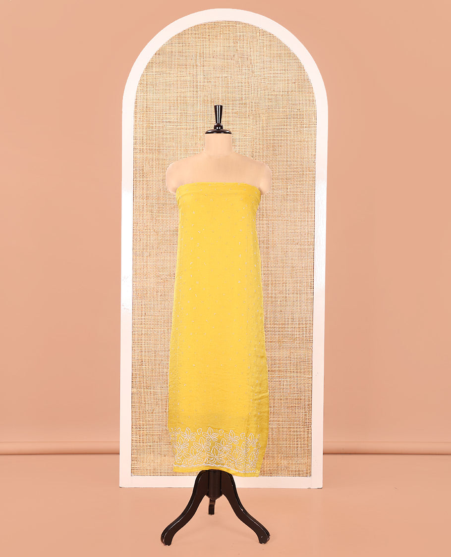 Yellow Moss Organza Material Churidar Set, Embellished with Floral Embroidery and Stone Struck on Its Top, a Plain Santoon Bottom, and Paired with a Moss Organza Stone Work Scallop Dupatta