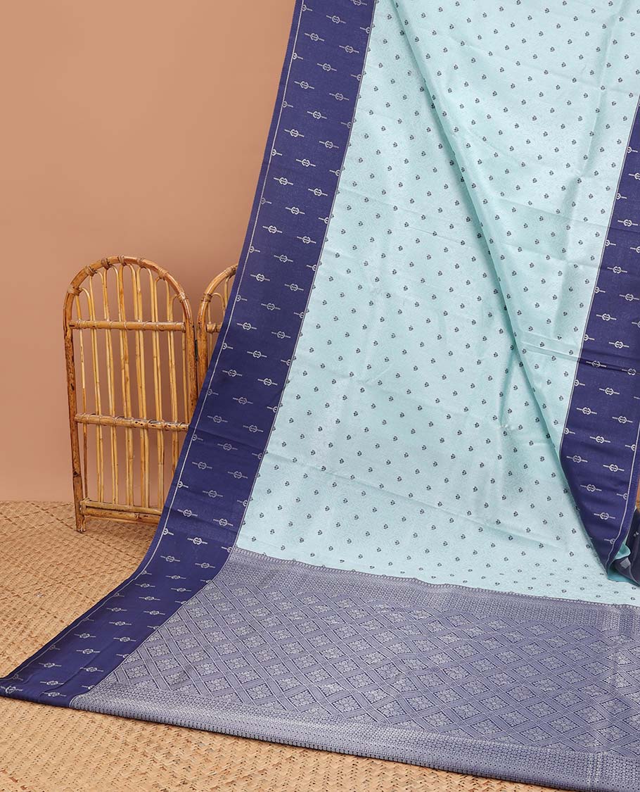 Light blue floral jacquard litchi silk saree with contrast zari design border & checked floral design pallu