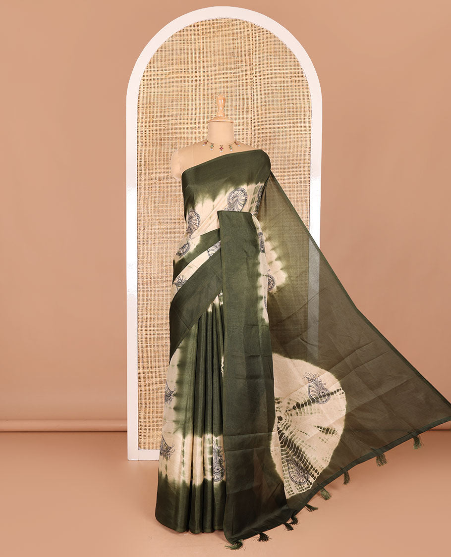 Borderless green shibori printed with shell motifs, blockprinted Manipur tussar saree, shibori printed pallu, and a plain matching blouse