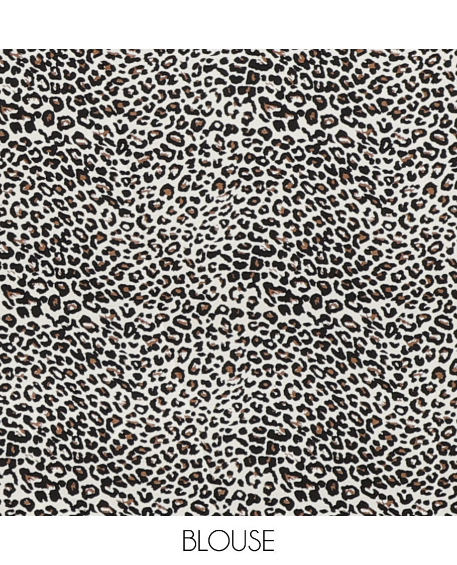Borderless black and white color leopard-skin-theme animal printed crepe saree with printed blouse