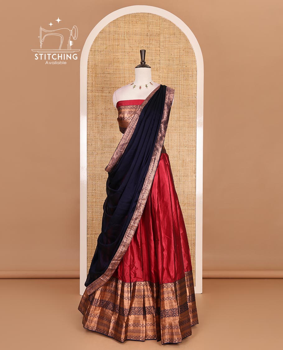 Red taffeta silk half saree, plain with contrast dark blue traditional zari big border, matching zari blouse, and contrast plain zari border dhavani