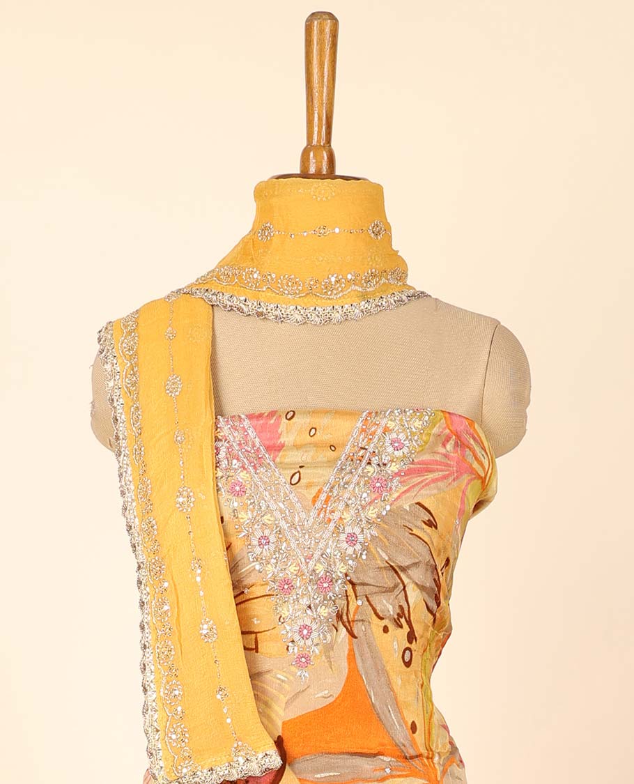 Yellow material chudidhar set, floral print & embroidered top, plain bottom & sequins embroidered dupatta