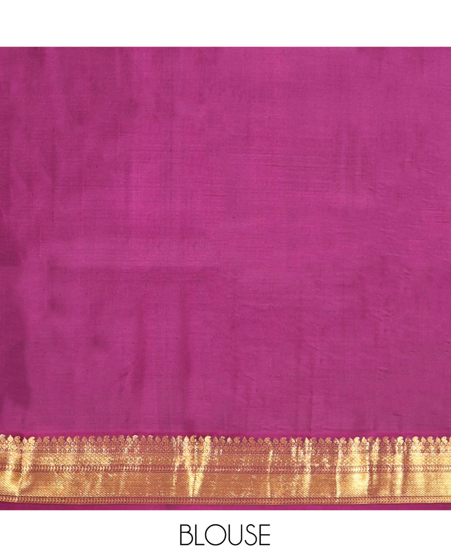 Green Vasundhara Silk Saree, Prettified with Zari Buttas All Over Its Body, Complemented by a Contrast Border of Thilakam, Manga, Muthu, Ara Bogudi, and Mayil Kann Designs, Grand Pallu, and Paired with a Contrast Blouse